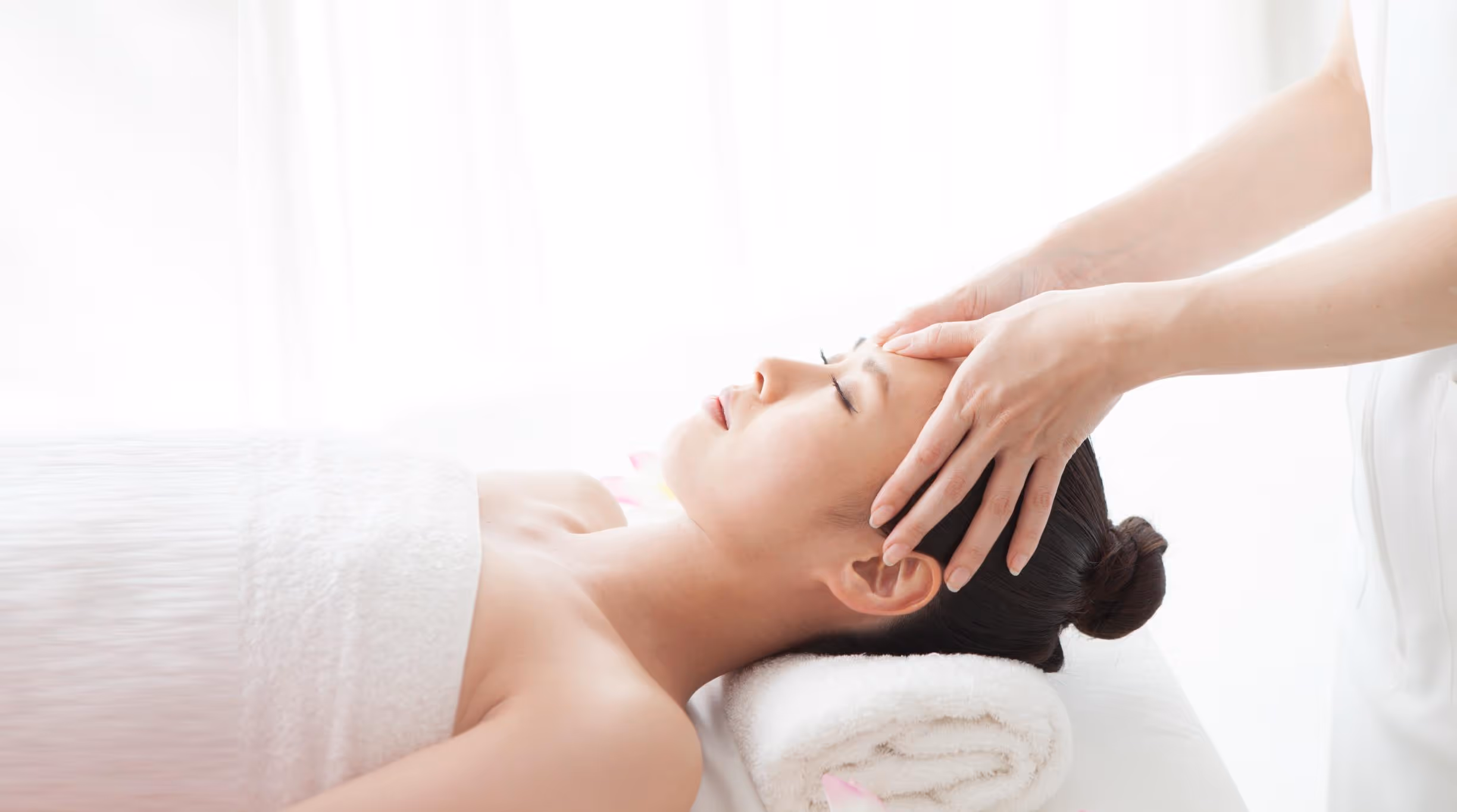 An Asian woman having a spa treatment 