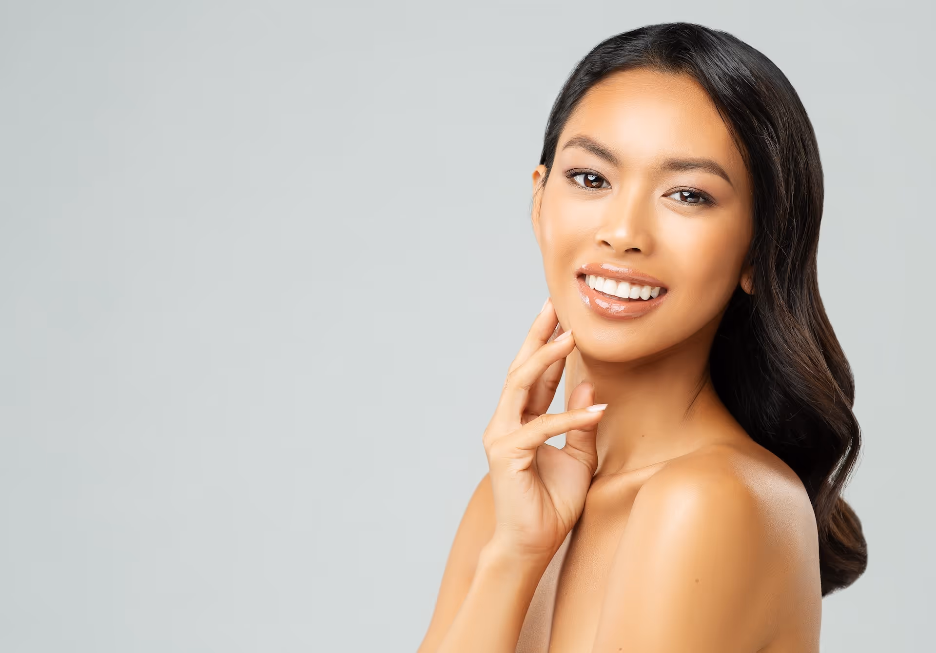 a beautiful Asian woman glowing 