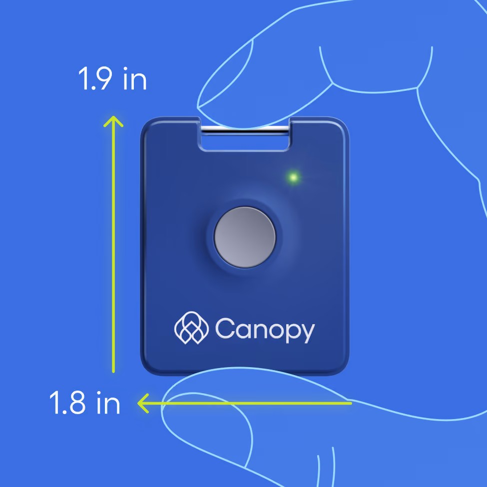 Small blue Canopy device held between thumb and forefinger, showing dimensions 1.9 inches tall and 1.8 inches wide, with a central circular button and a small green indicator light.