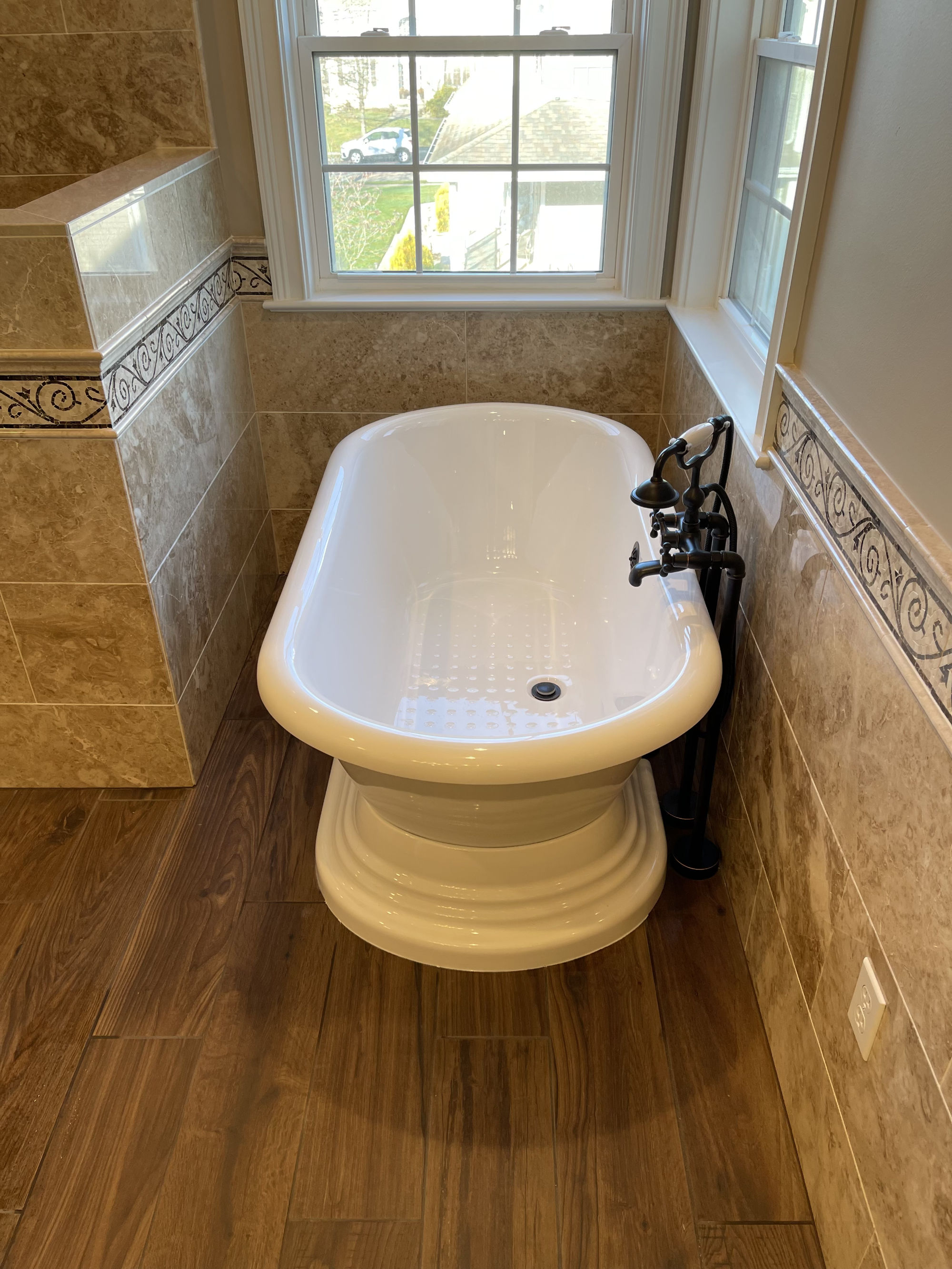 free staning floating tub on schluter heated floor