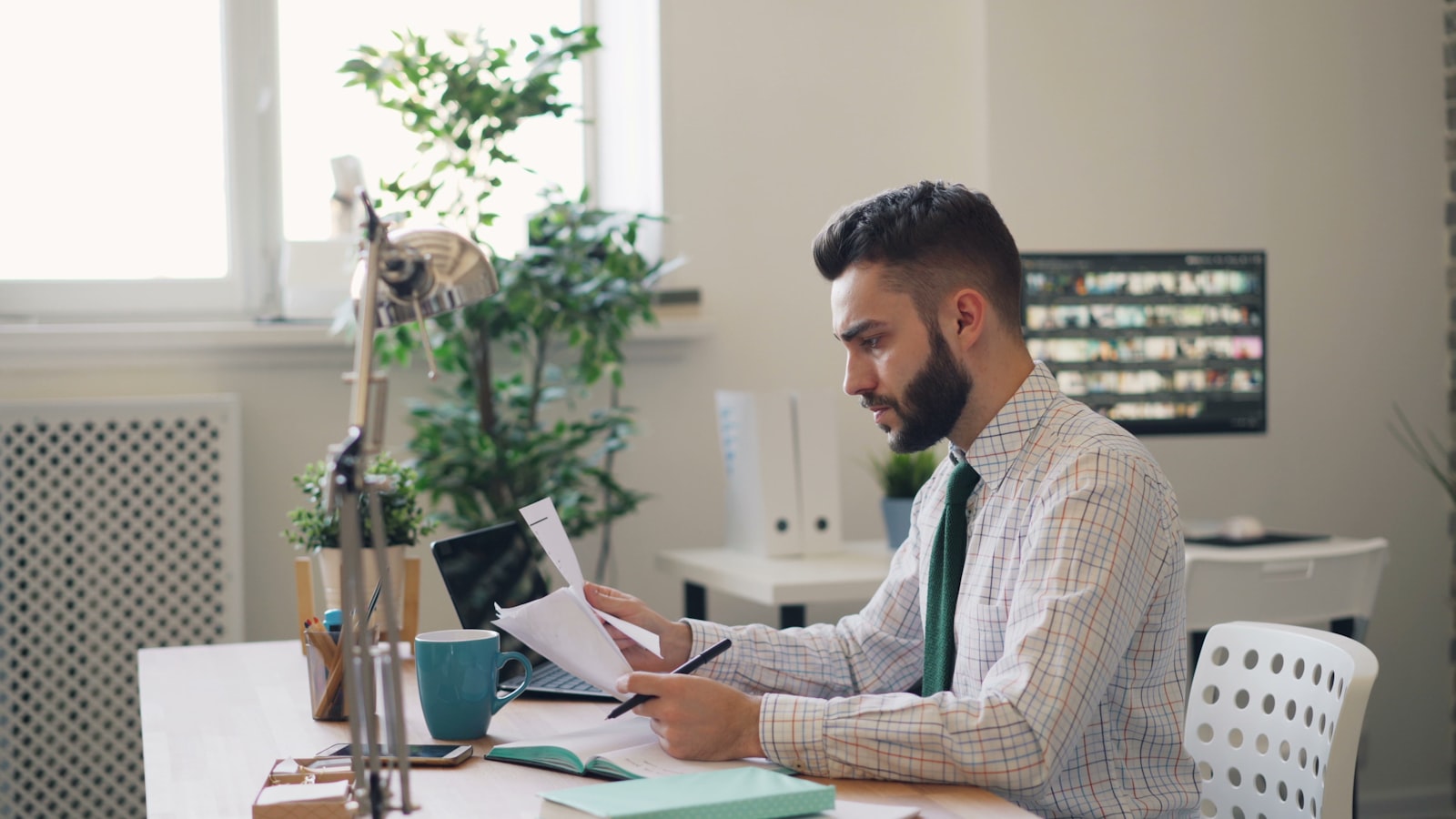 Working at a desk with a laptop