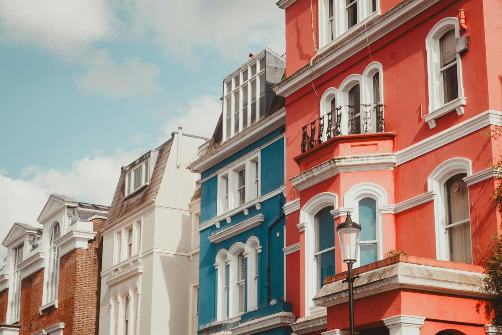 A row of colourful terraced houses