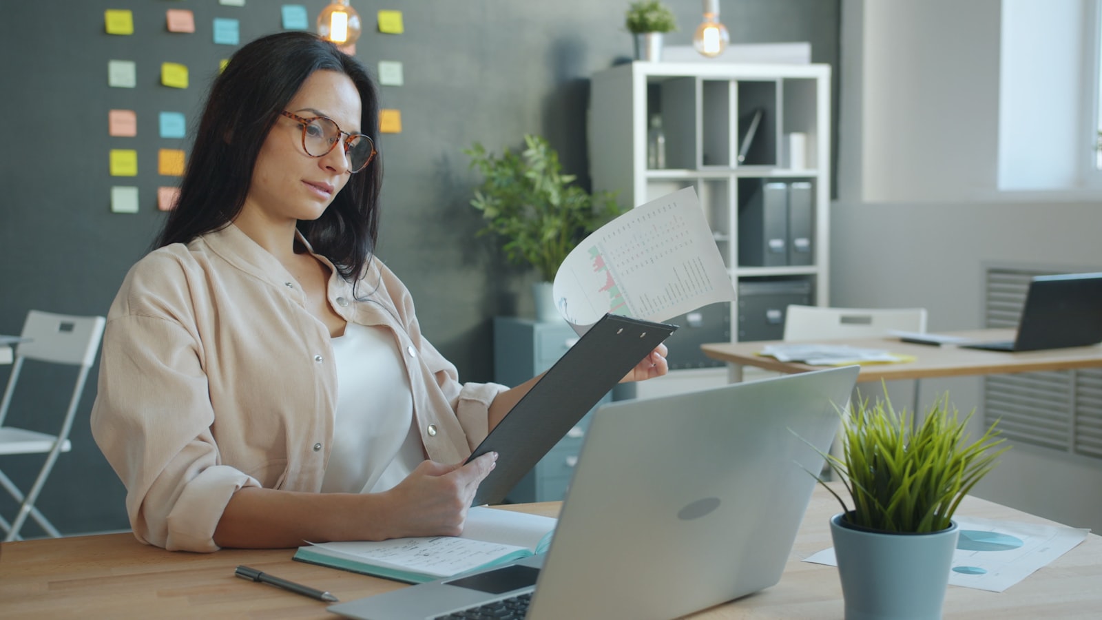 Reviewing documents at a desk