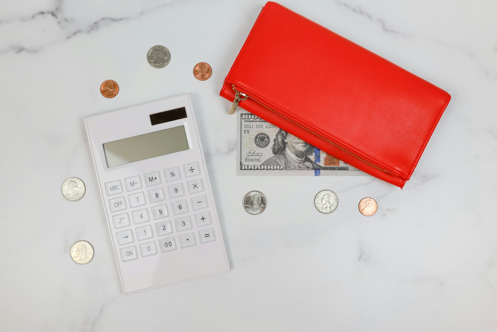 A wallet and coins