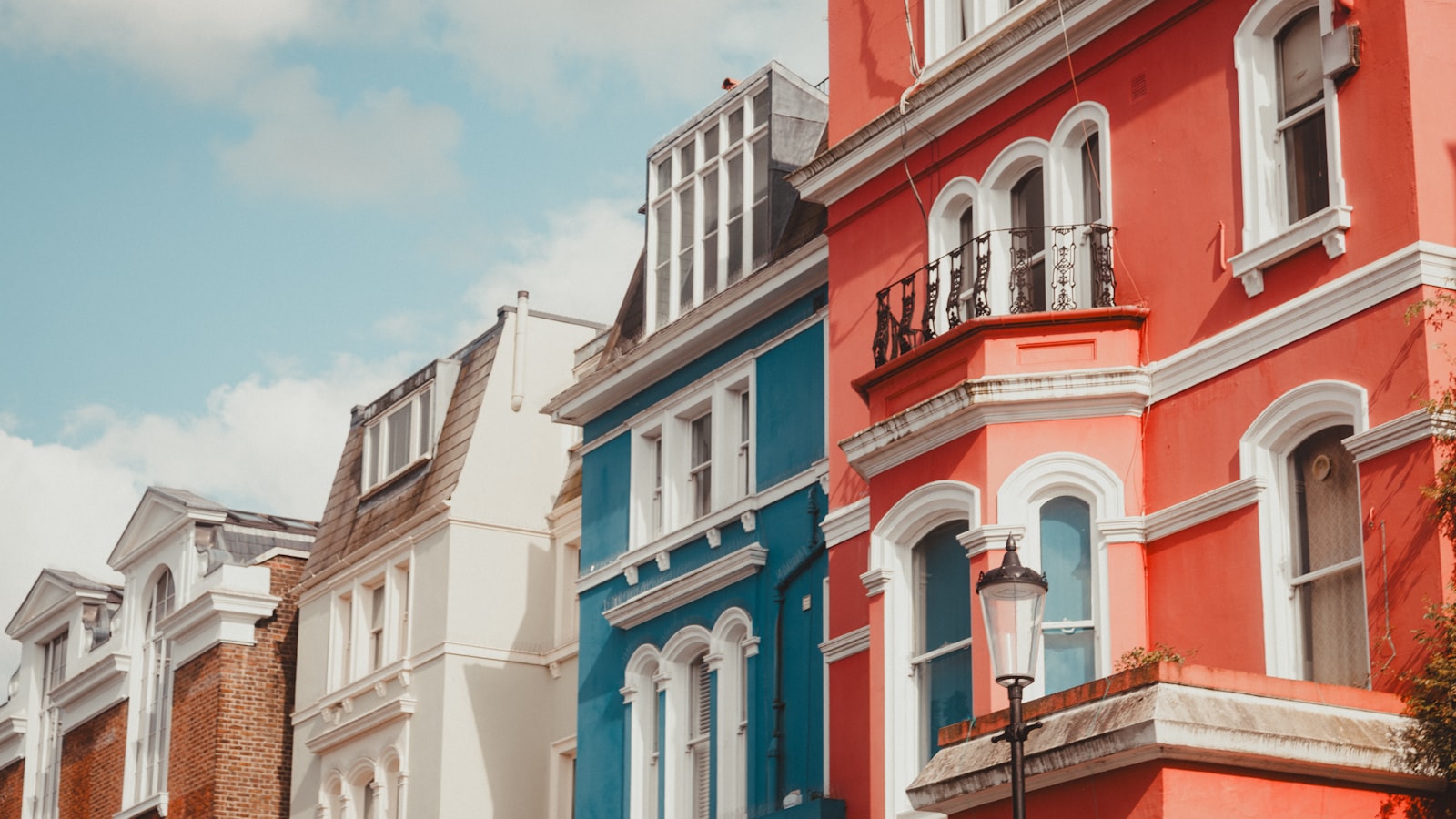 A row of colourful British terraced houses
