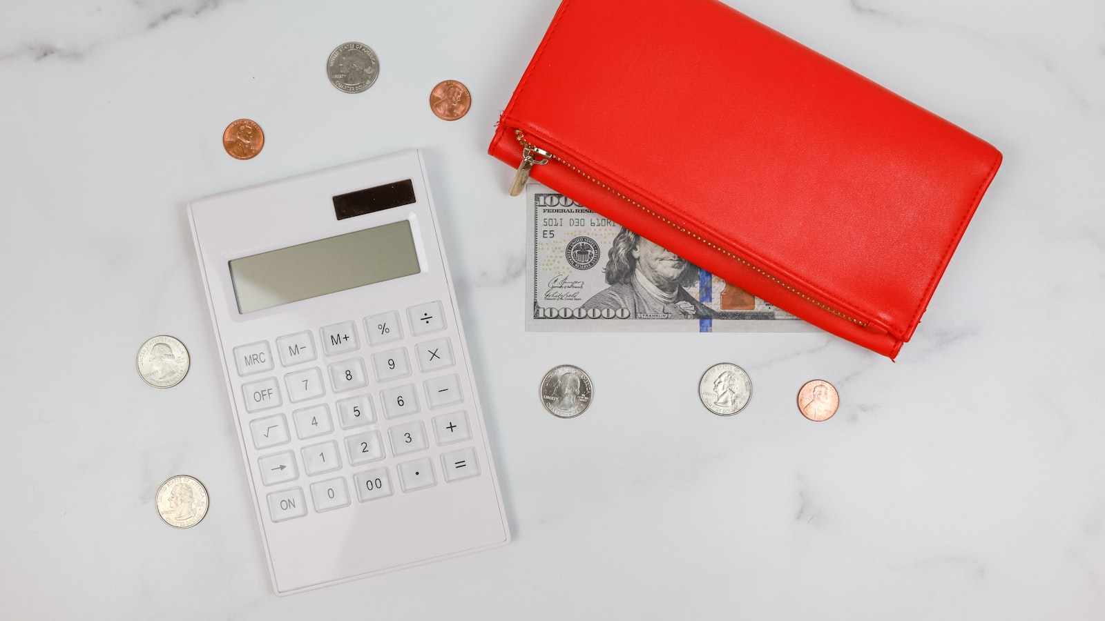 A wallet and coins representing managing a tax bill