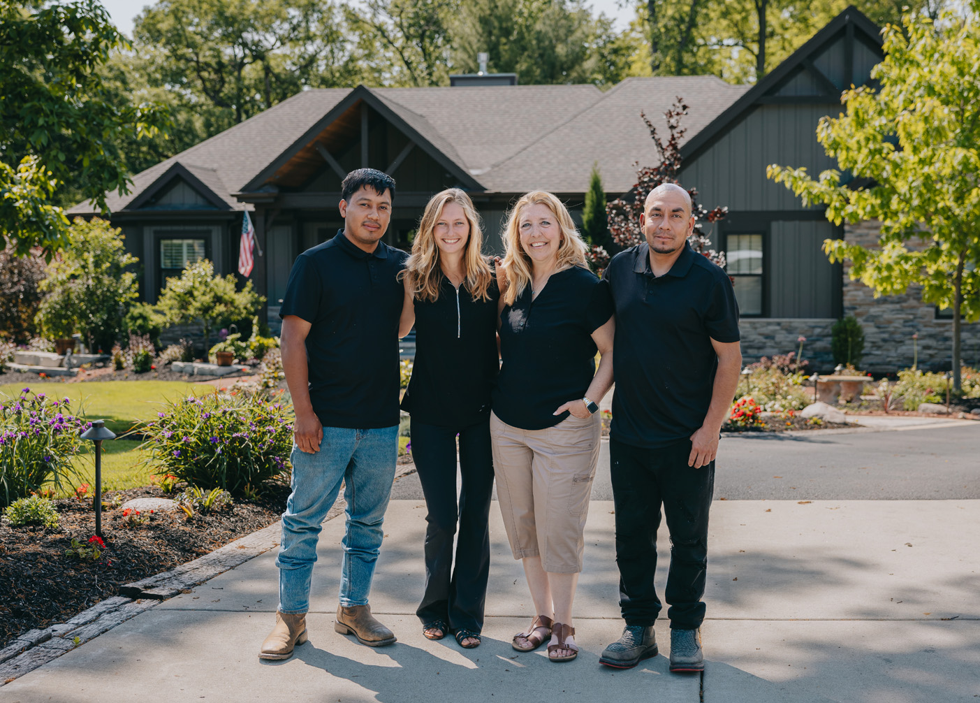 The Custom Scapes & Designs team — landscaping and outdoor design professionals serving the Chicago suburbs