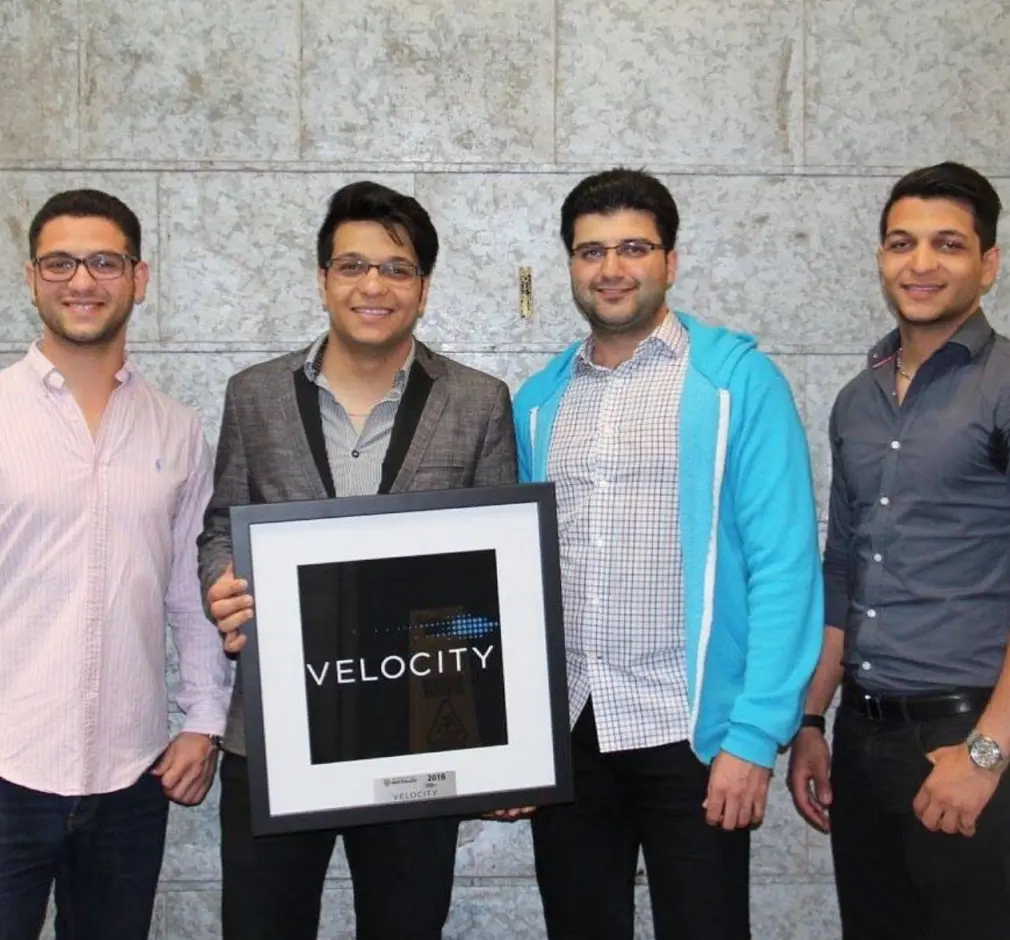 Early ApplyBoard team with Sina Sadeghian and founders in first office