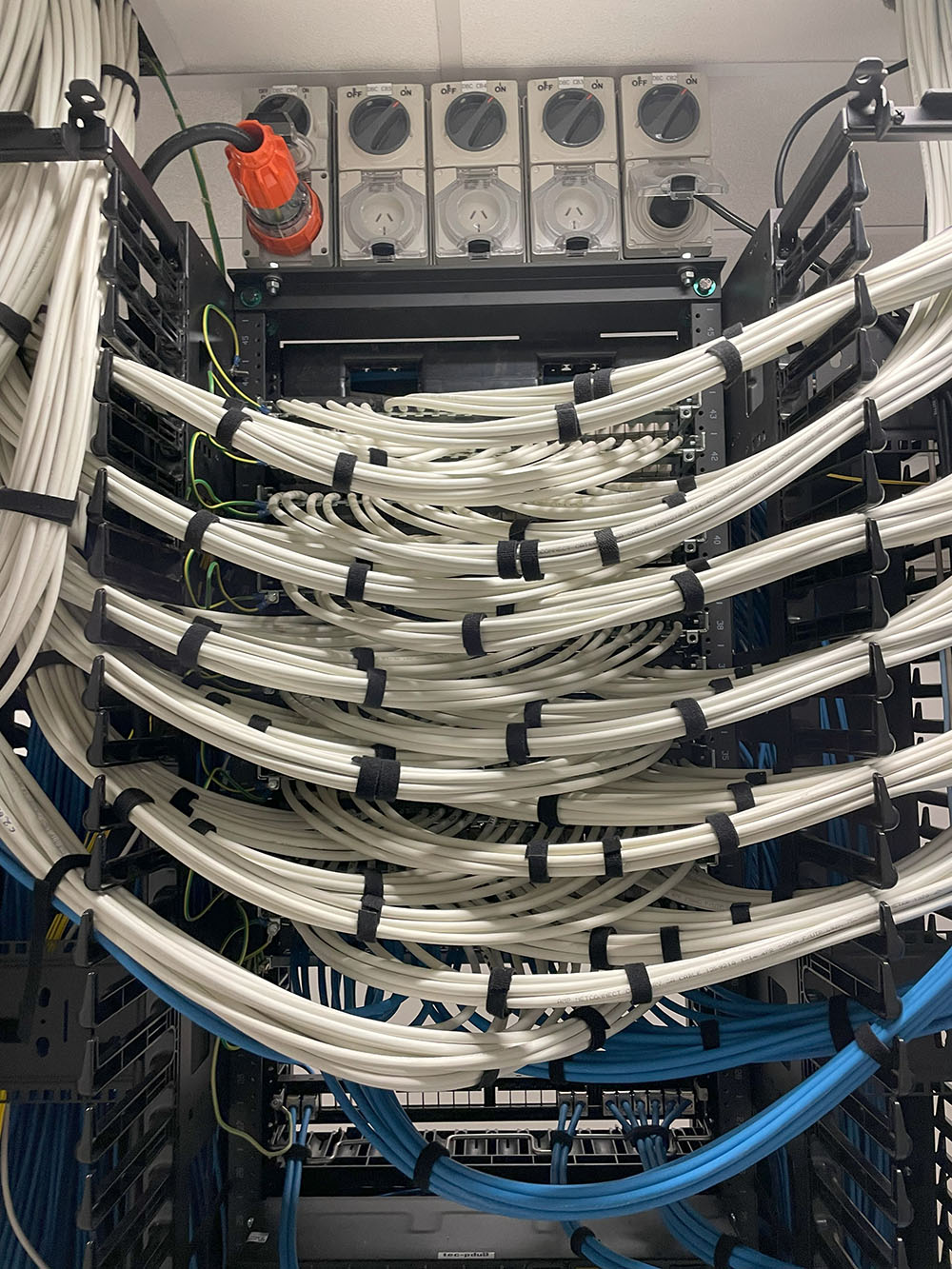 Electrical and data cabling in a data cabinet