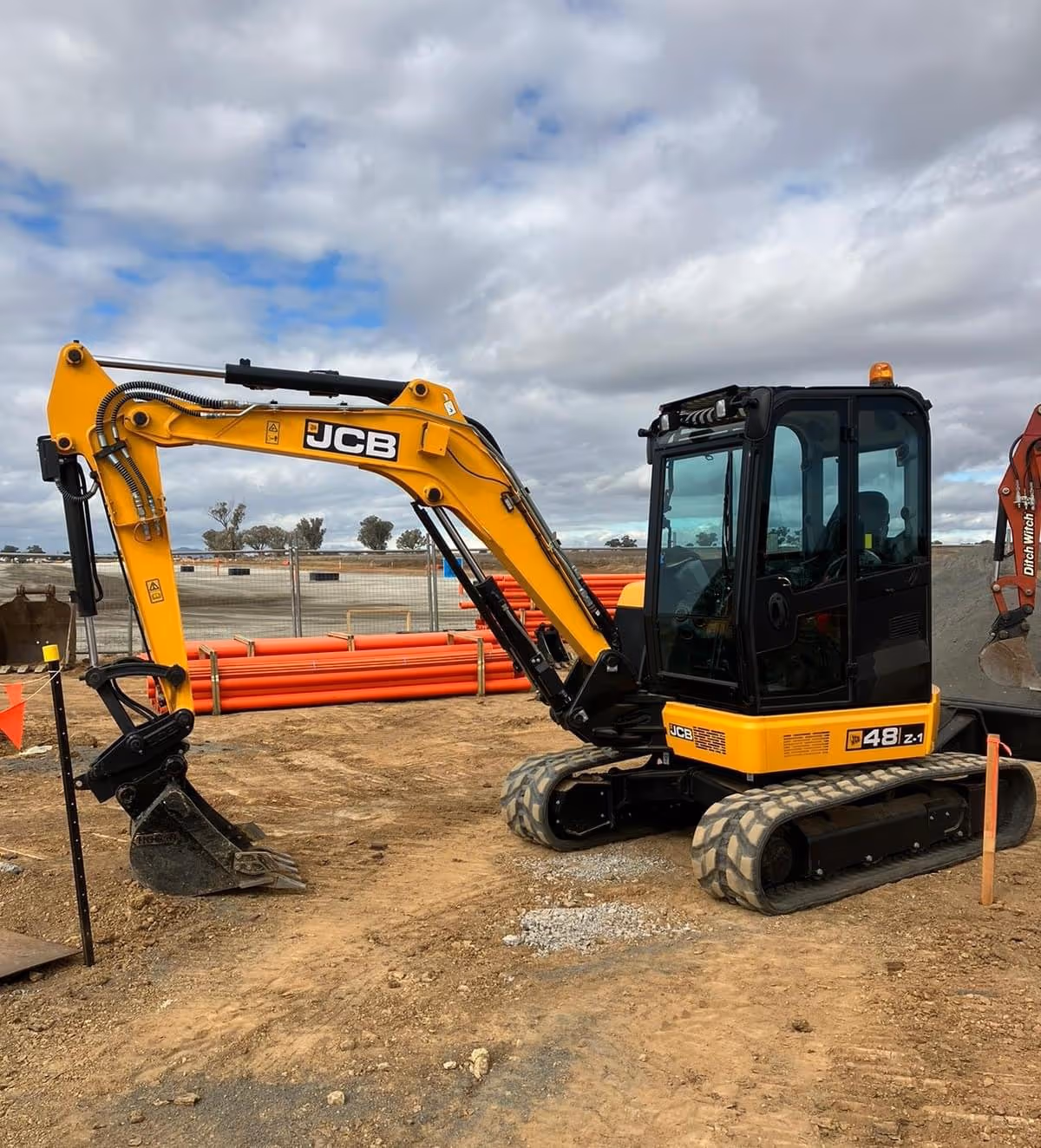 Excavator digging up the ground
