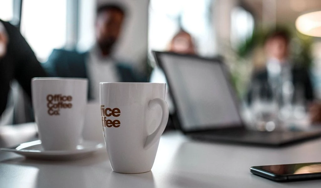 employees are working and having a cup of coffee
