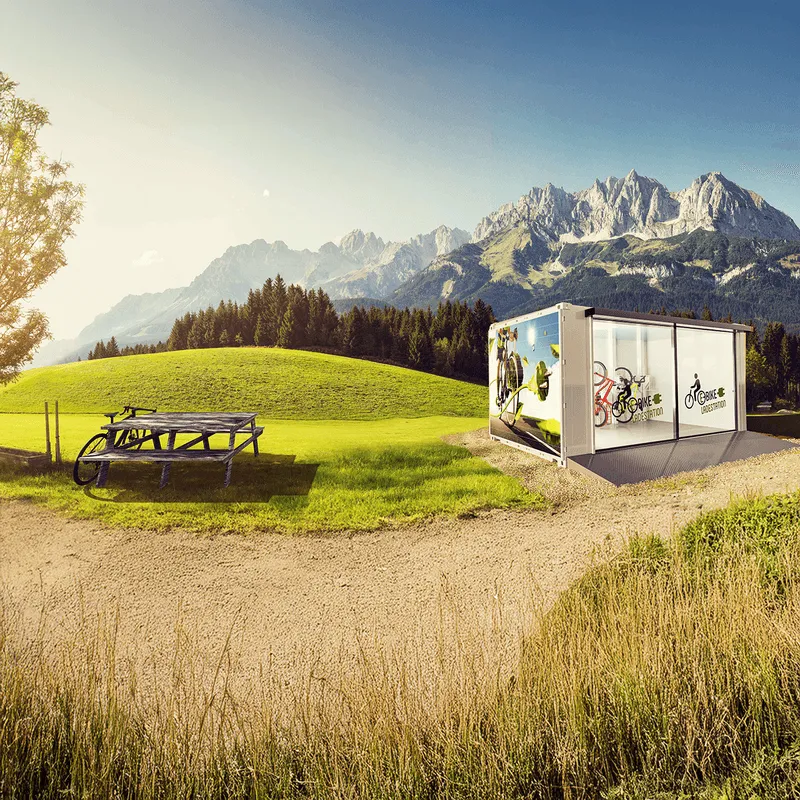 E-Bike Container auf einem Radweg in den Bergen