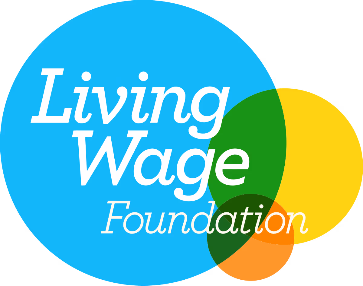 Logo of Living Wage Foundation with overlapping blue, green, yellow, and orange circles.