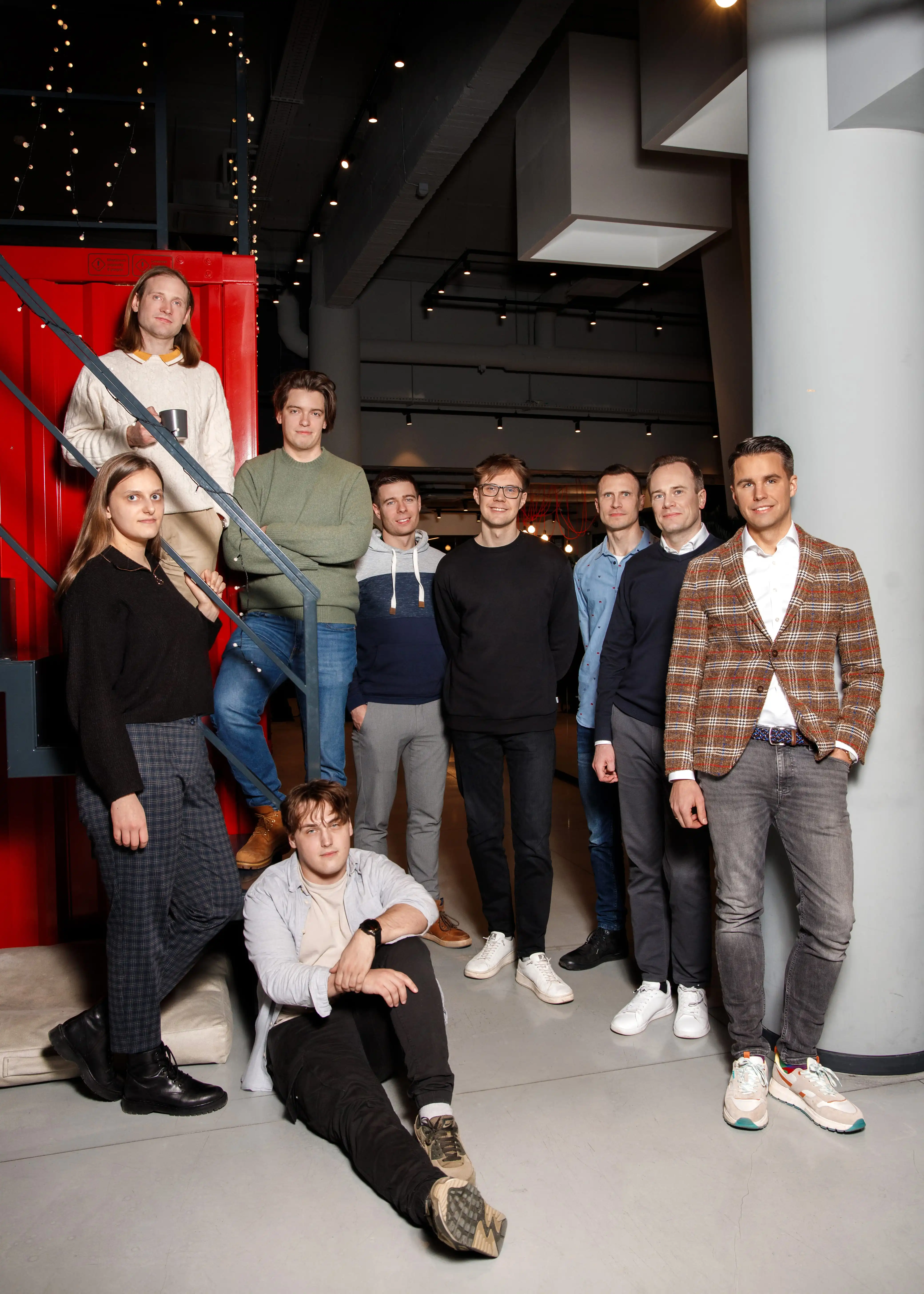 The team of digetiers - nine team members next to each other.