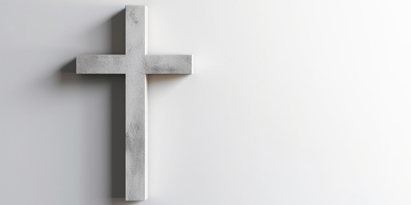 Bildet viser et kors med hvit bakgrunn