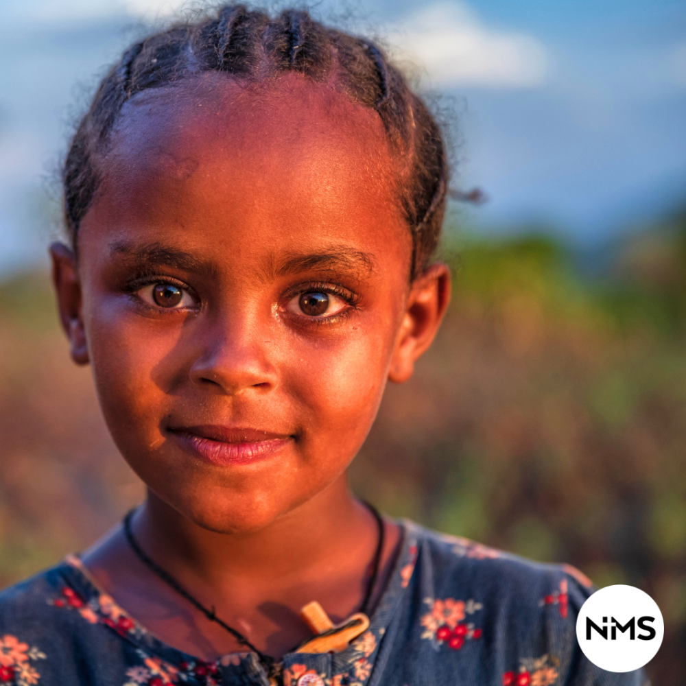 Bildet viser et nærbilde av ei jente