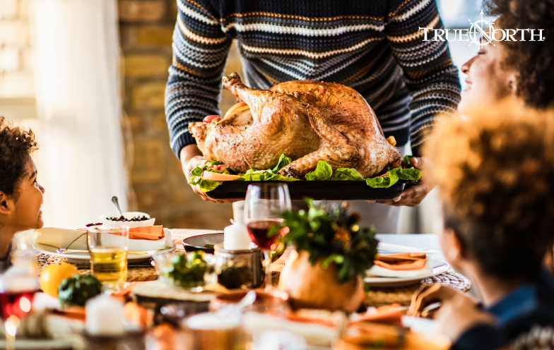 Family at Thanksgiving table
