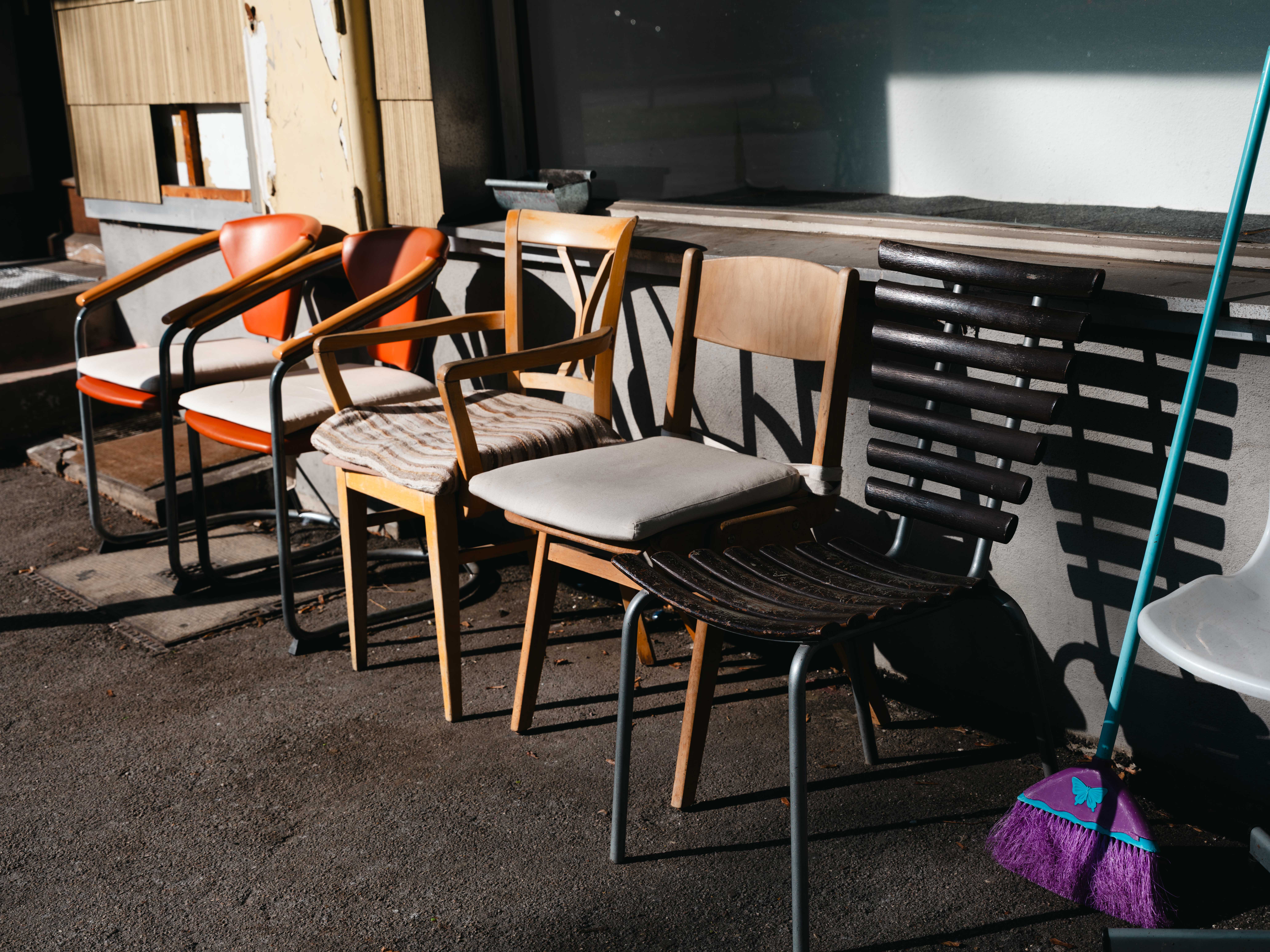 a group of chairs outside a building