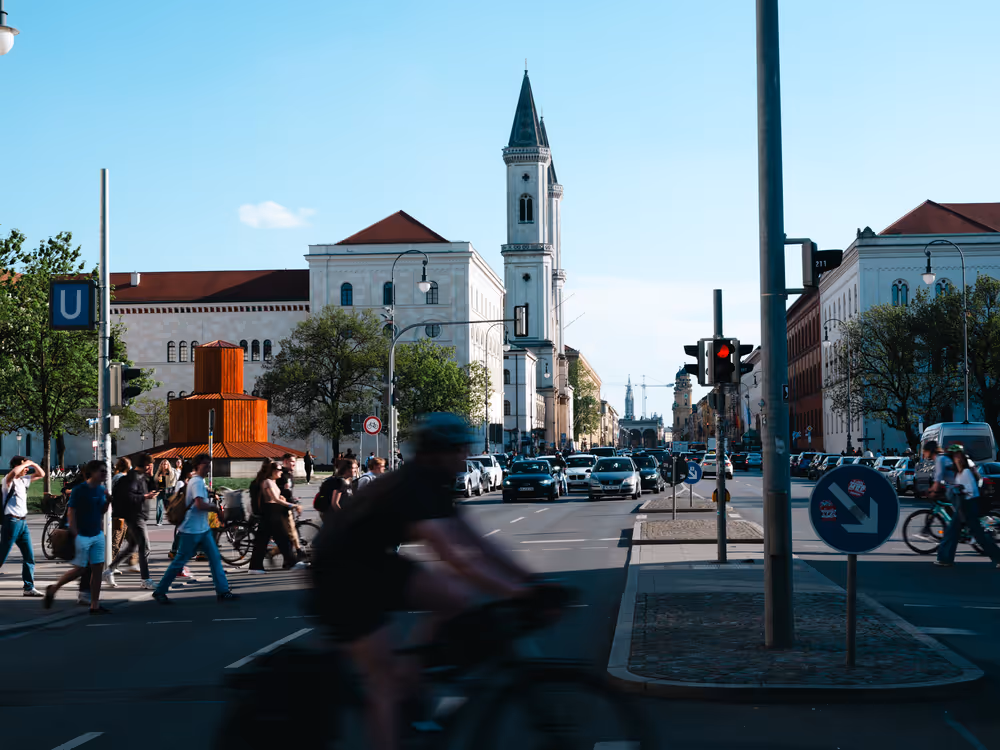 a group of people walking on a street