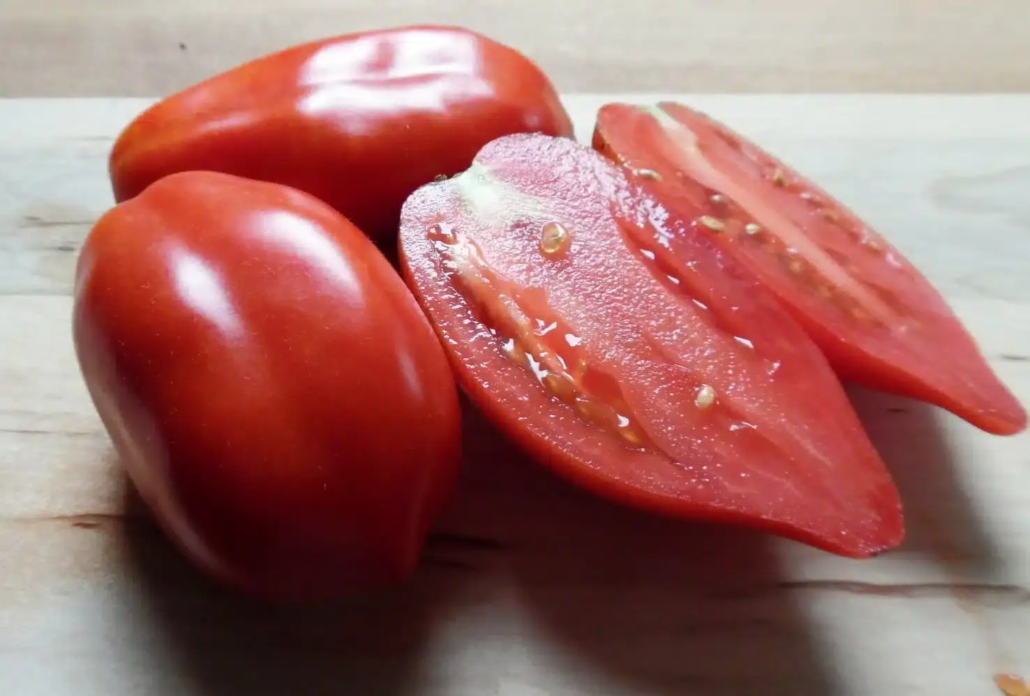 Fresh ripe tomatoes being prepared for canning preservation