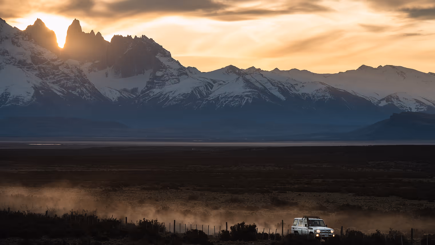 4x4 driving with mountains in the background