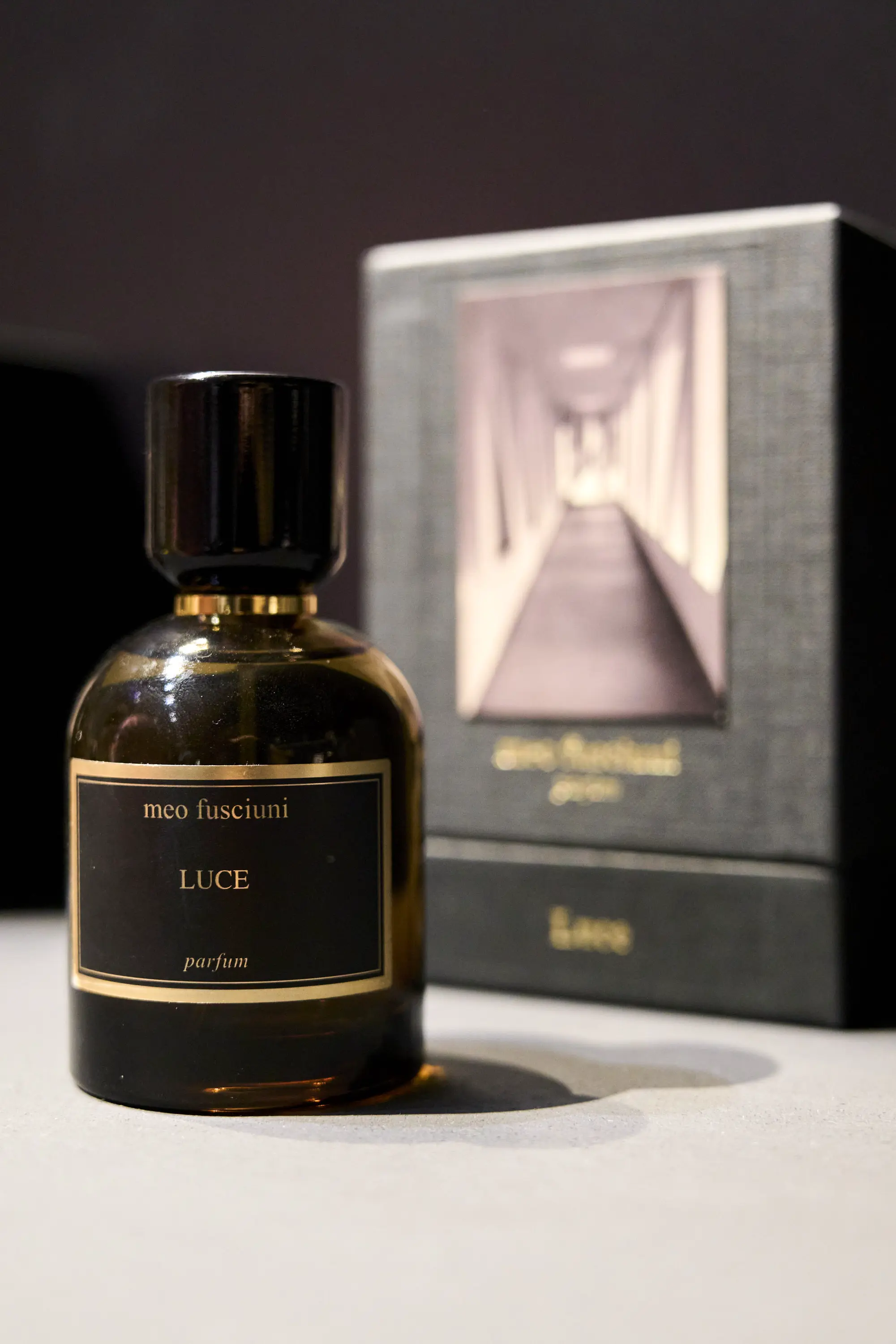 Bottle of Meo Fusciuni "Luce" perfume with packaging, showcased at Pitti Fragranze 2025 in Florence