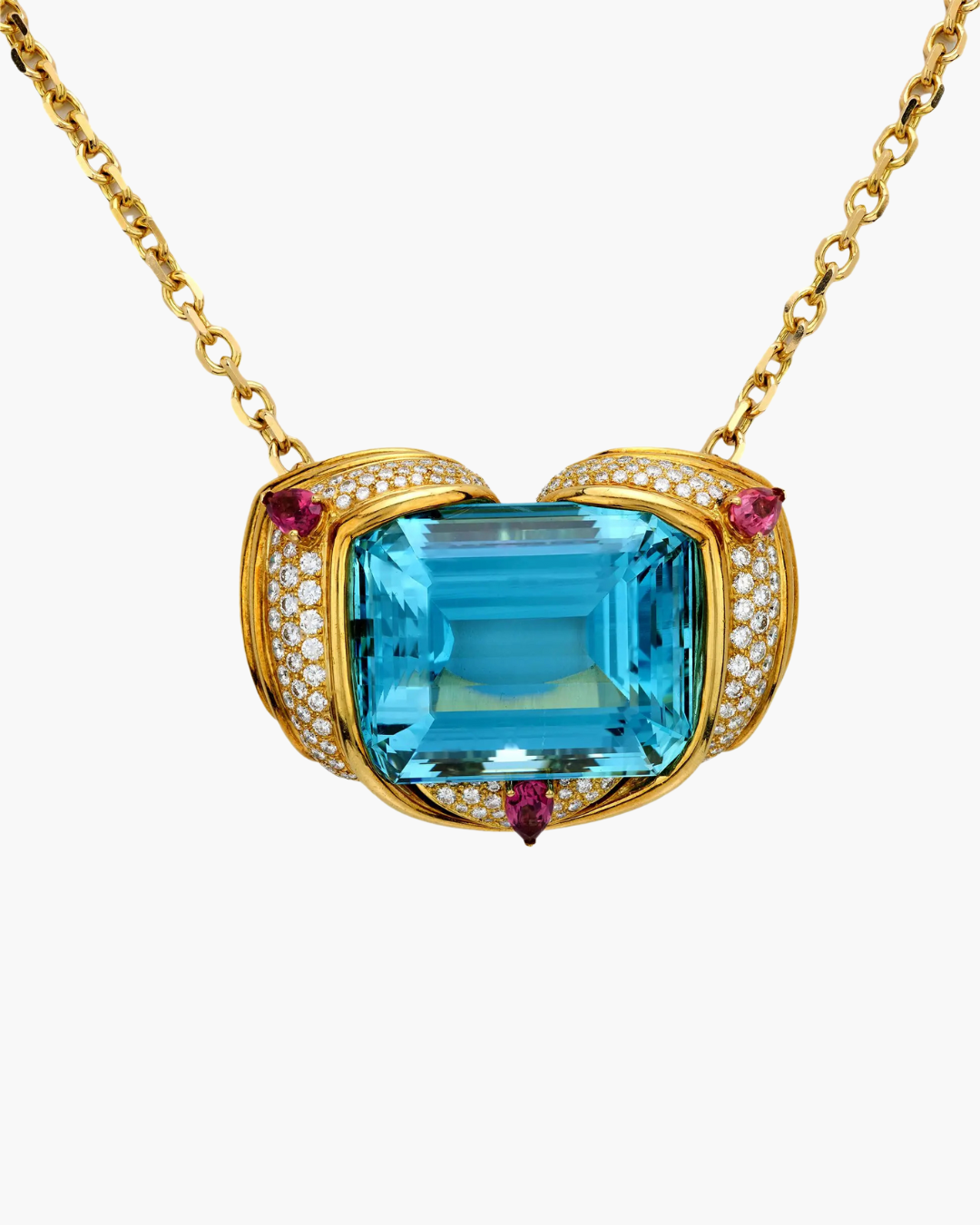 Close-up of a vintage Hammerman Brothers pendant featuring a large rectangular Santa Maria aquamarine surrounded by diamonds and pink tourmalines, set in 18k yellow gold on a gold chain.