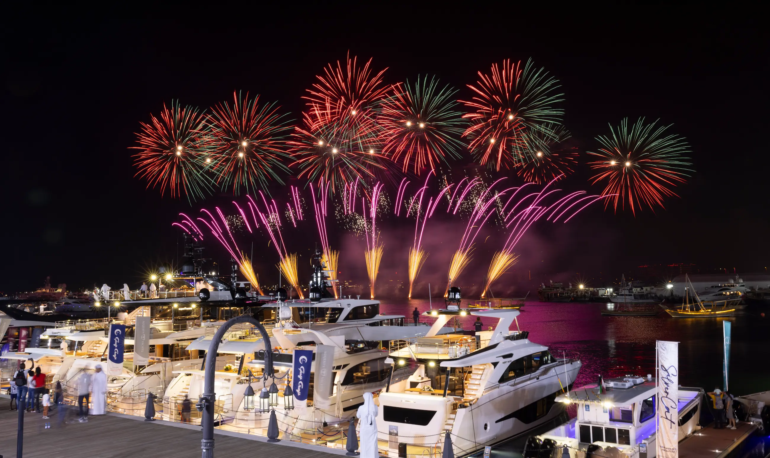 Spectacular fireworks light up the sky above luxury yachts during the opening night of the Qatar Boat Show 2025 at Old Doha Port in Doha, Qatar.