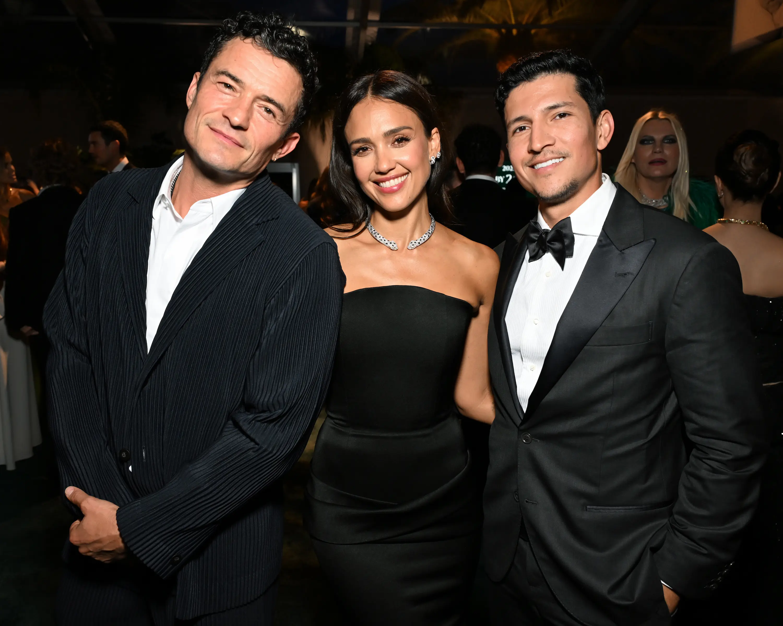 Guests dressed in elegant black-tie attire pose together during the 2025 Baby2Baby Gala at the Pacific Design Center in West Hollywood, celebrating philanthropy and style.