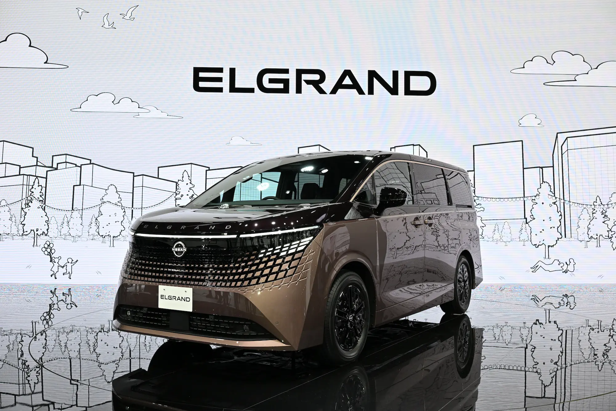 The new Nissan Elgrand luxury minivan on display at the Japan Mobility Show 2025, showcasing elegant design, Japanese craftsmanship, and advanced hybrid technology for a premium driving experience.