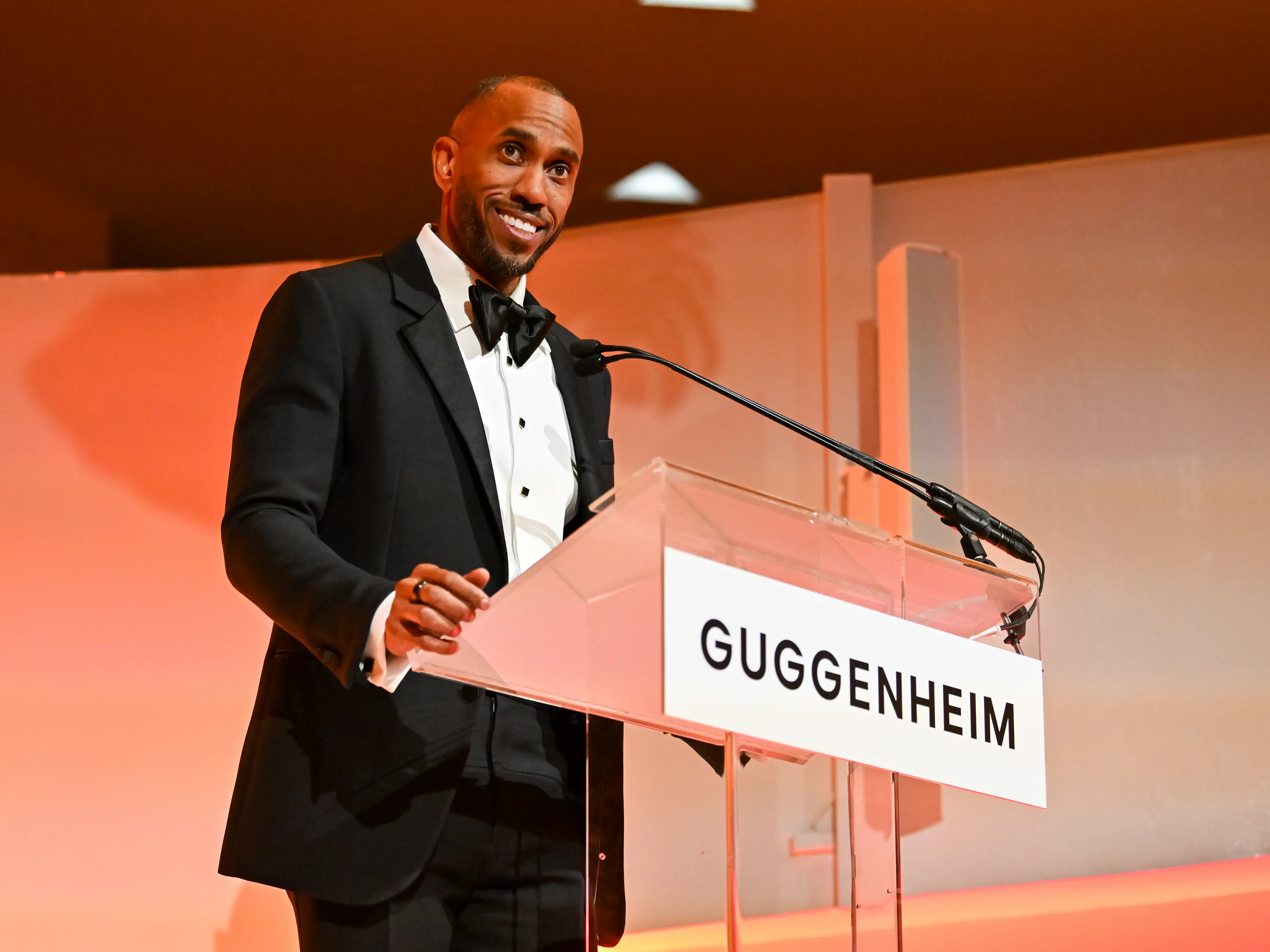 Andre Iguodala, NBPA Executive Director and former NBA champion, speaking at podium during Guggenheim Museum 2025 benefit gala honoring NBA and NBPA