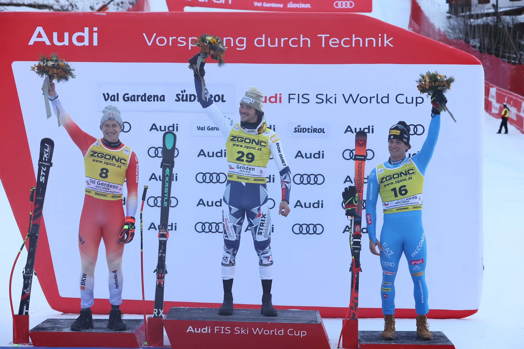 Jan Zabystran celebrating historic first Czech World Cup victory with Marco Odermatt and Giovanni Franzoni on super-G podium at Val Gardena