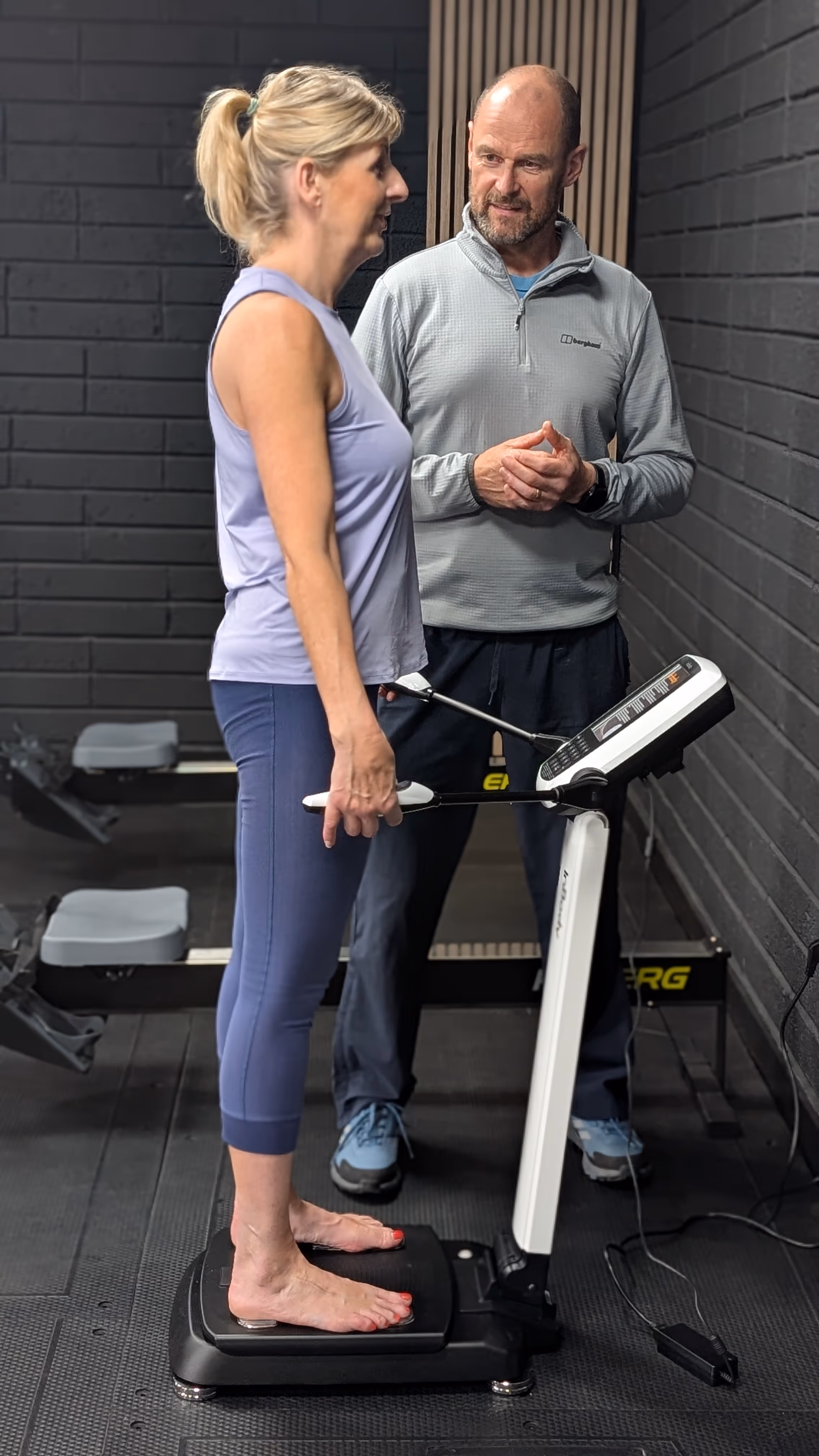 A personal trainer giving an InBody composition scan