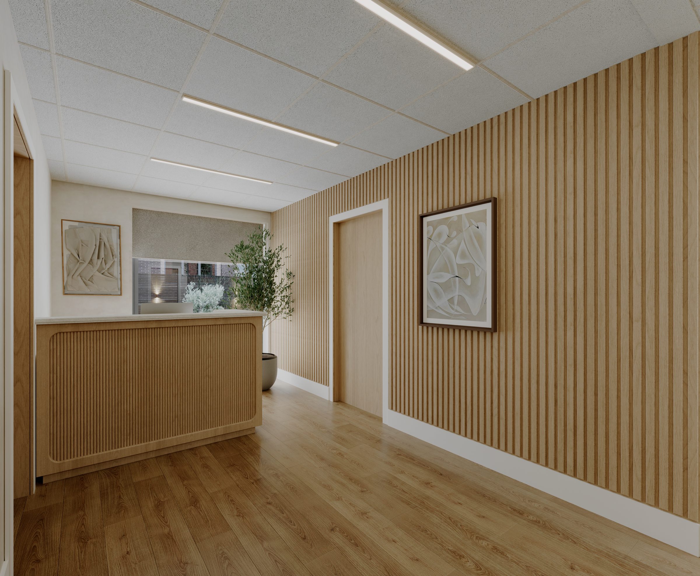 The PrimaryMD SoHo reception, with a wood-slat desk and natural light