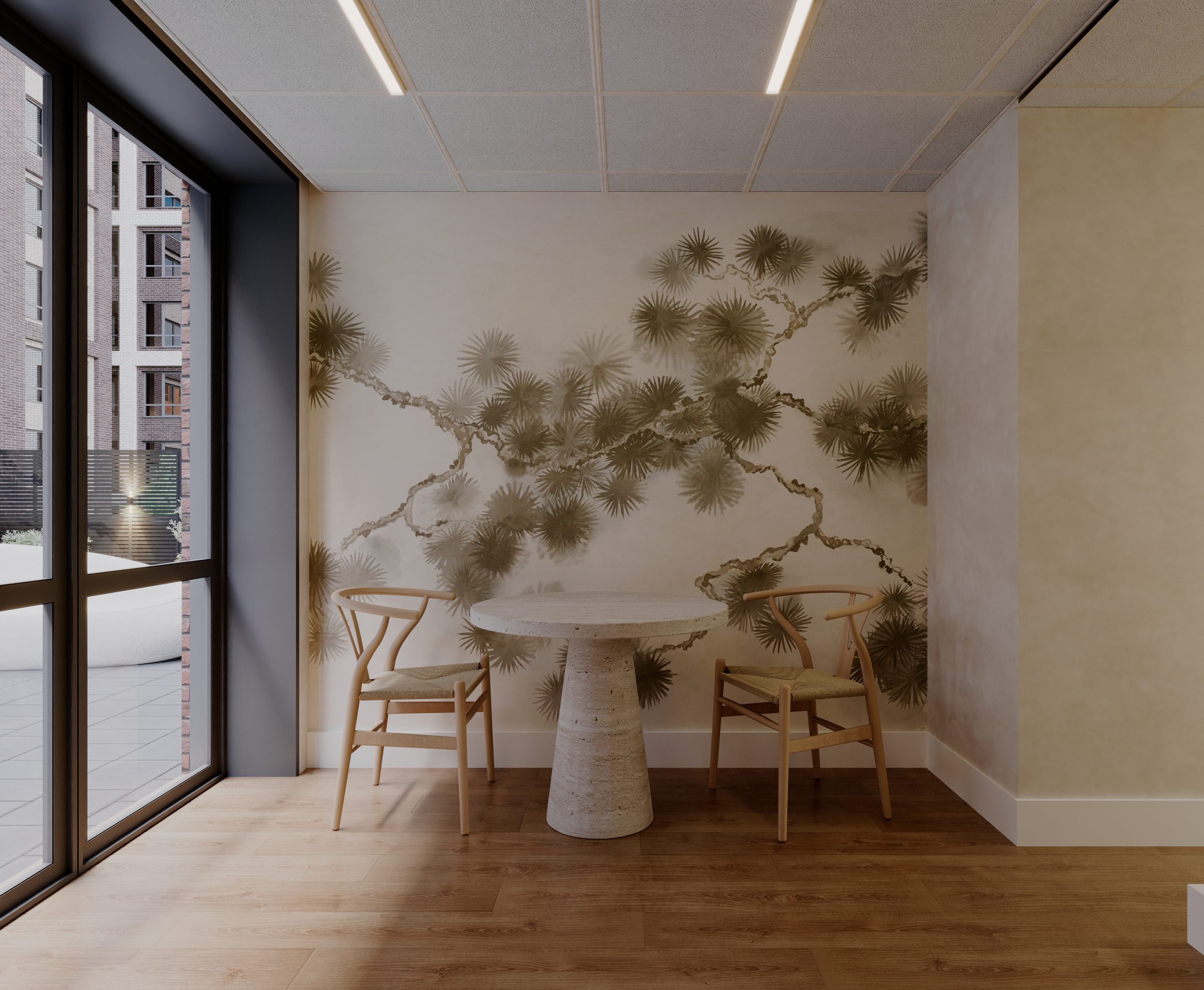 A PrimaryMD SoHo consultation room, with a round table and a pine mural