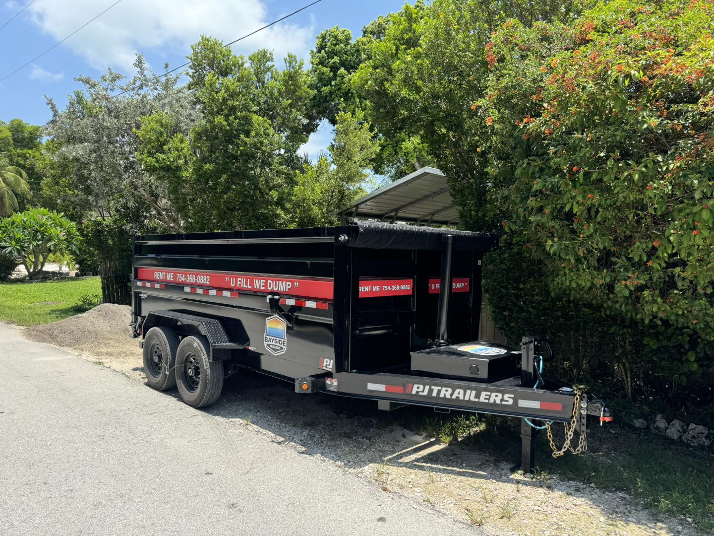 Bayside Trailers dumpster rental at a home in Islamorada.
