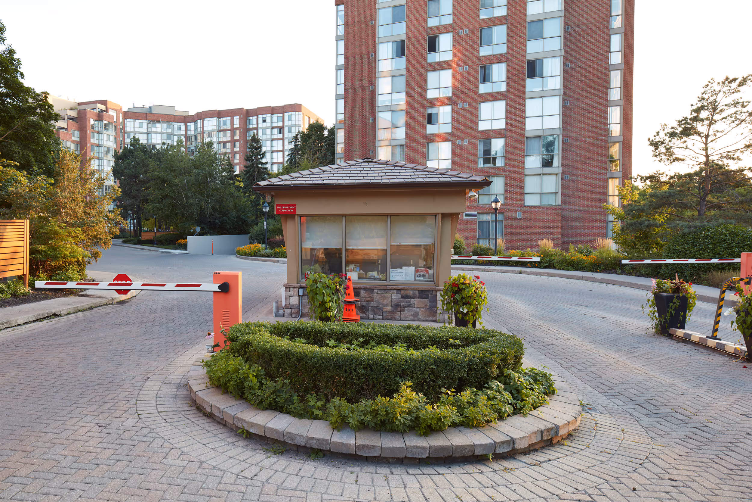 Property Gateway with stone flower bed