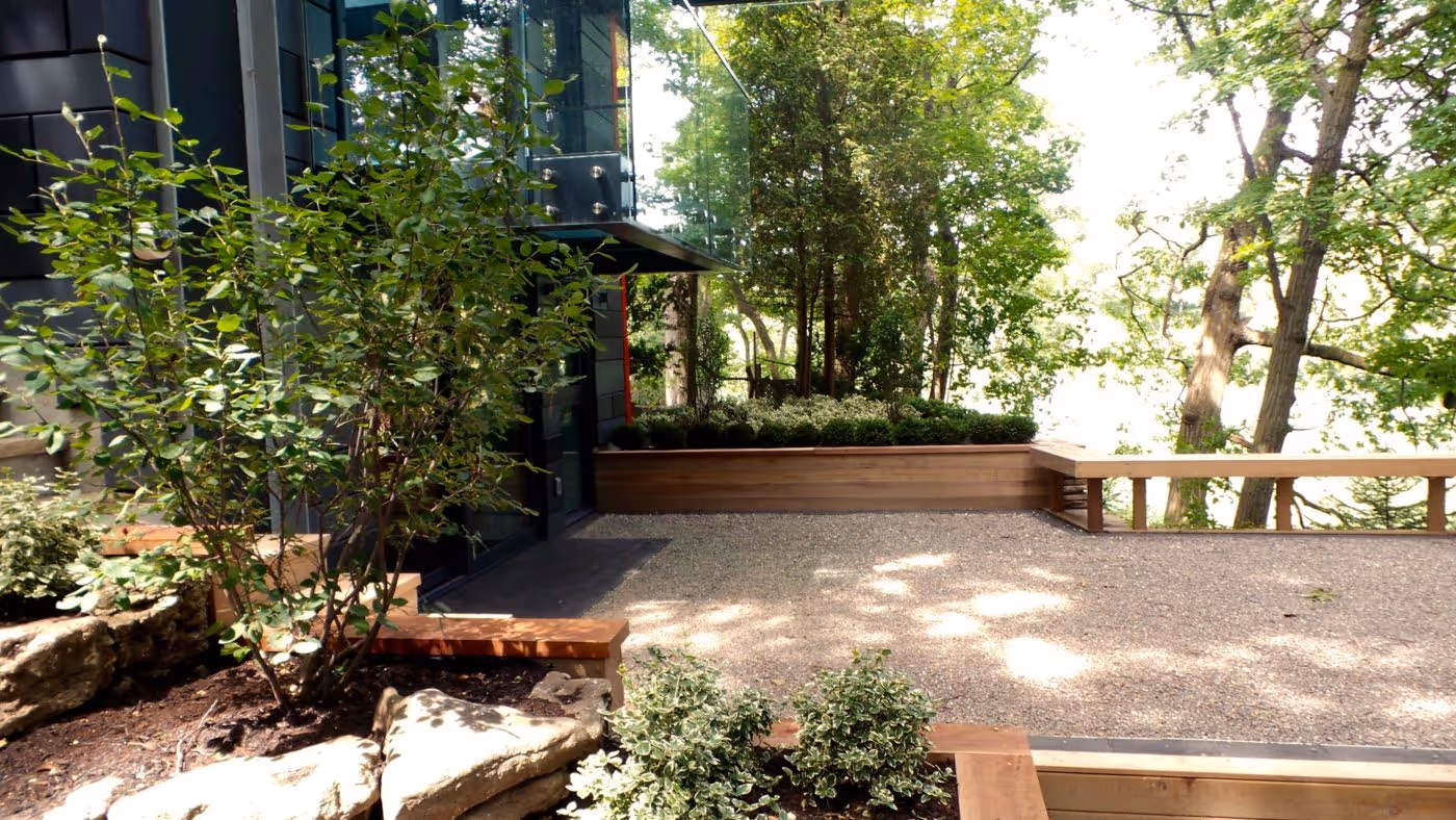 Outdoor Gravel deck with wood railing