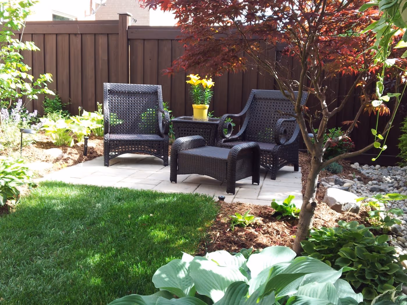 Out Door Seating area with freshly mulched gardens