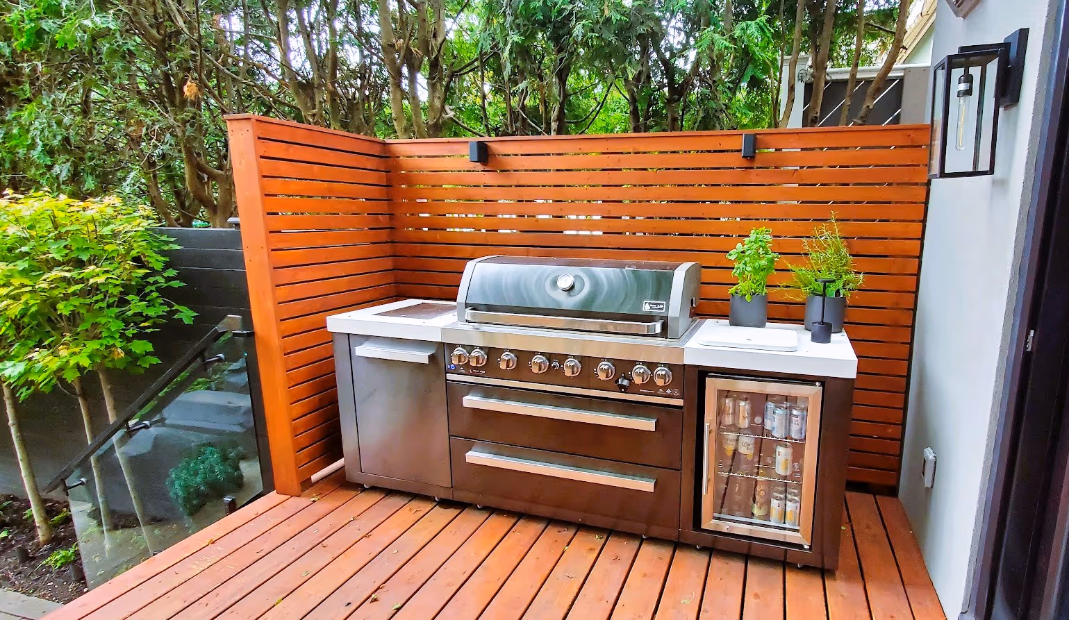 Outdoor Grill in wooden built cubby to provide perfect BBQ spot