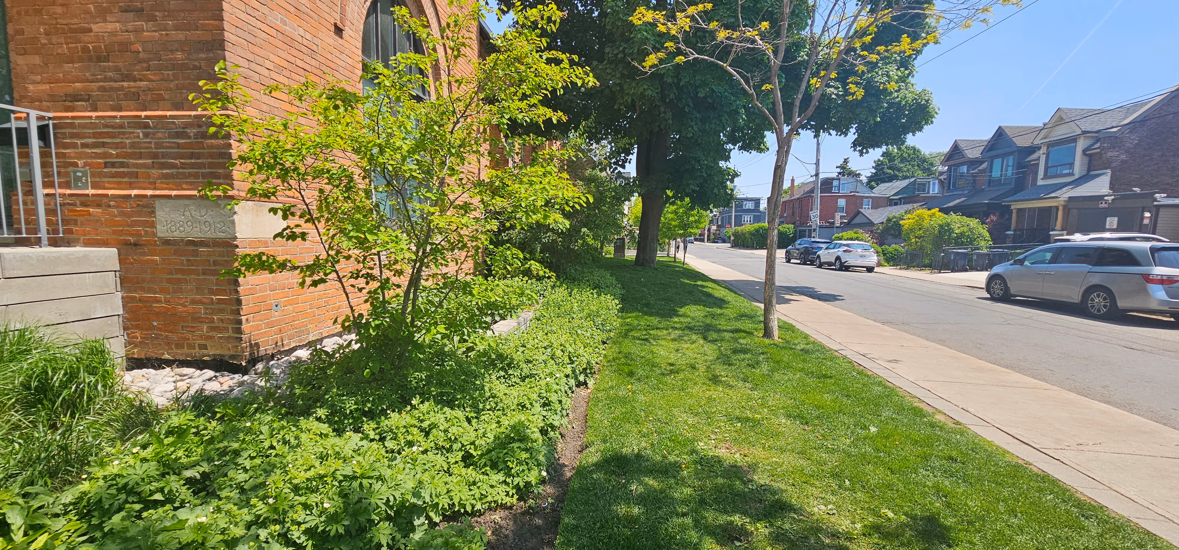 Garden beds outside of town homes main entrance
