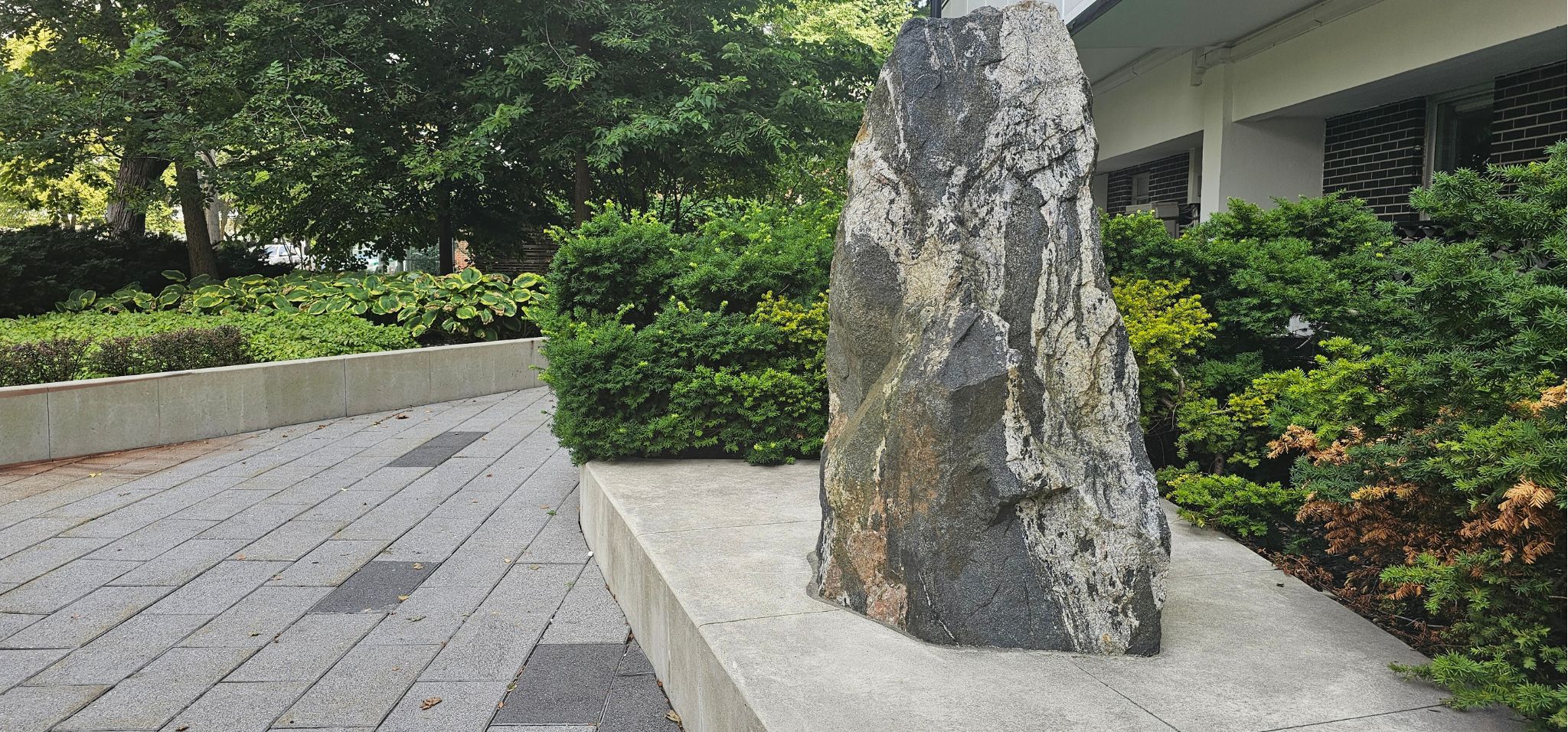 Stone sculpture at commercial maintenance building