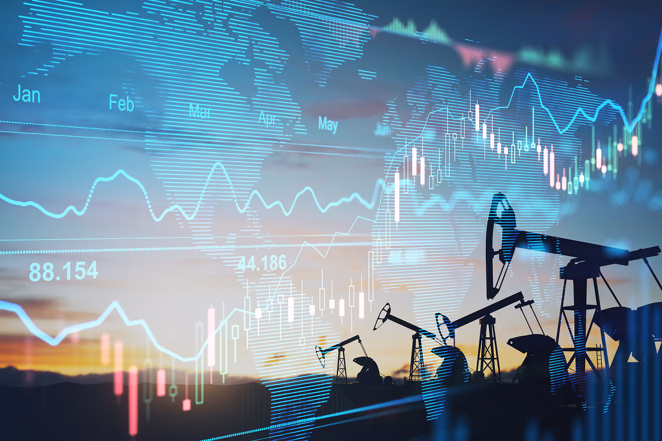 Silhouettes of oil pump jacks at sunset overlaid with digital stock market graphs and a world map.