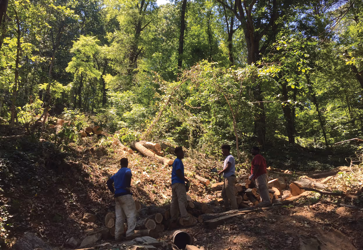 Howard School Interns work on the land.