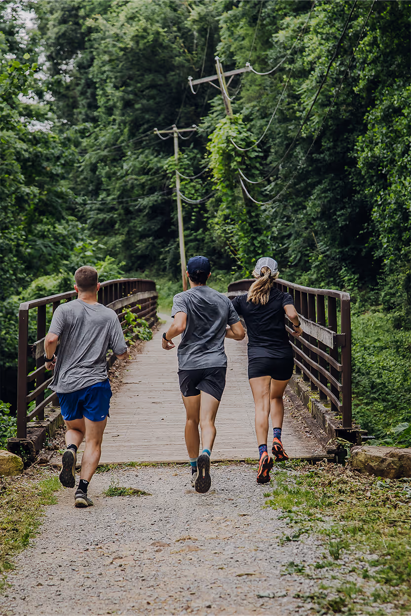 Runners run on the trails at Lookout Mountain Conservancy