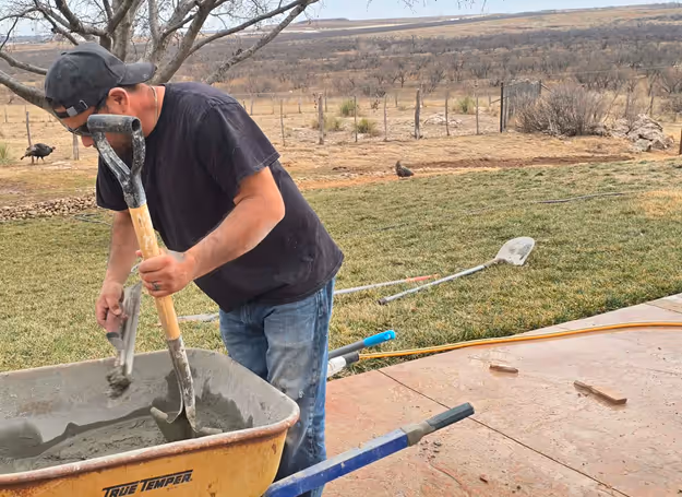 Ernesto Mixing concrete in Amarillo Texas 