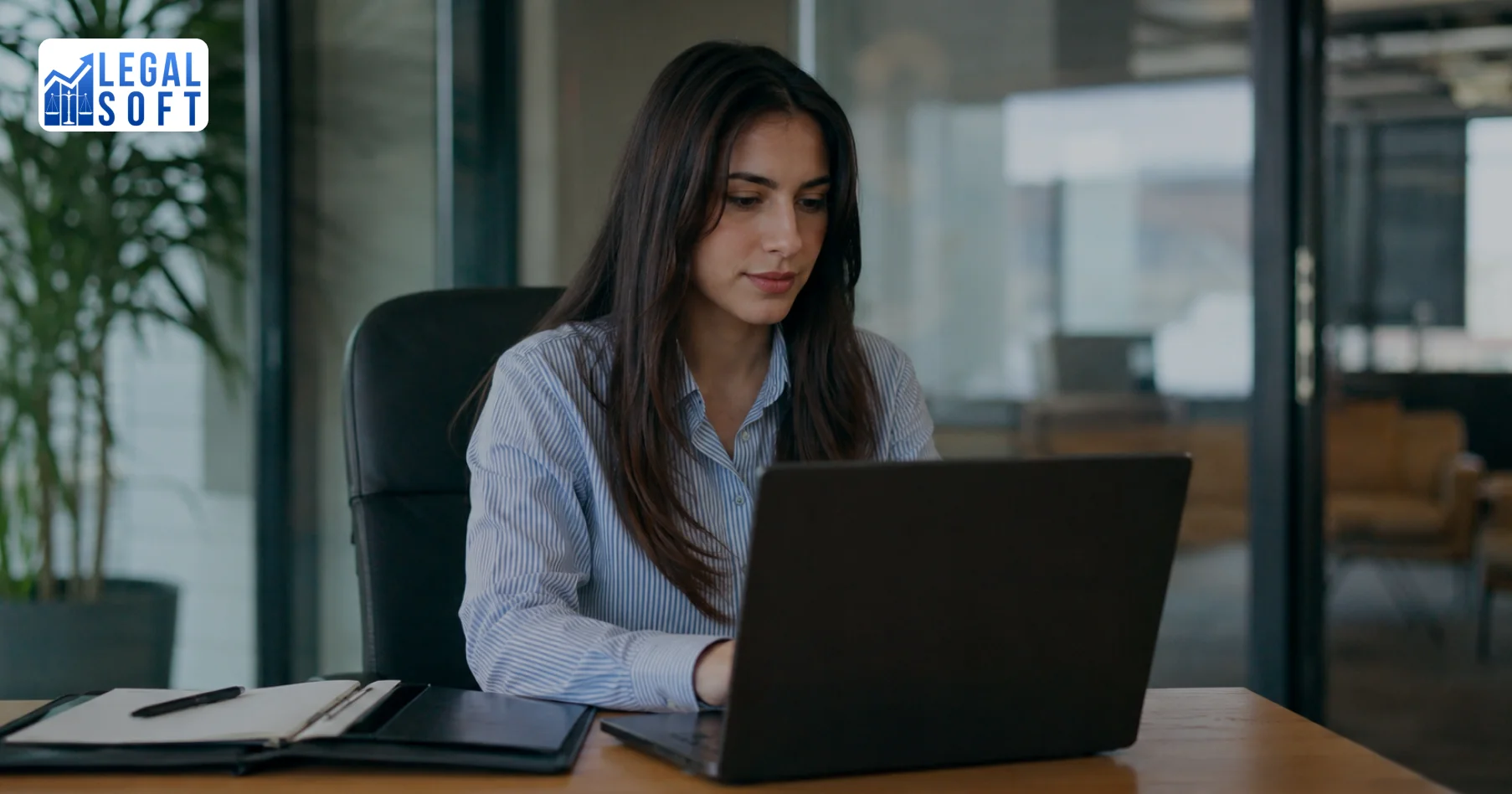 paralegal doing legal work on laptop