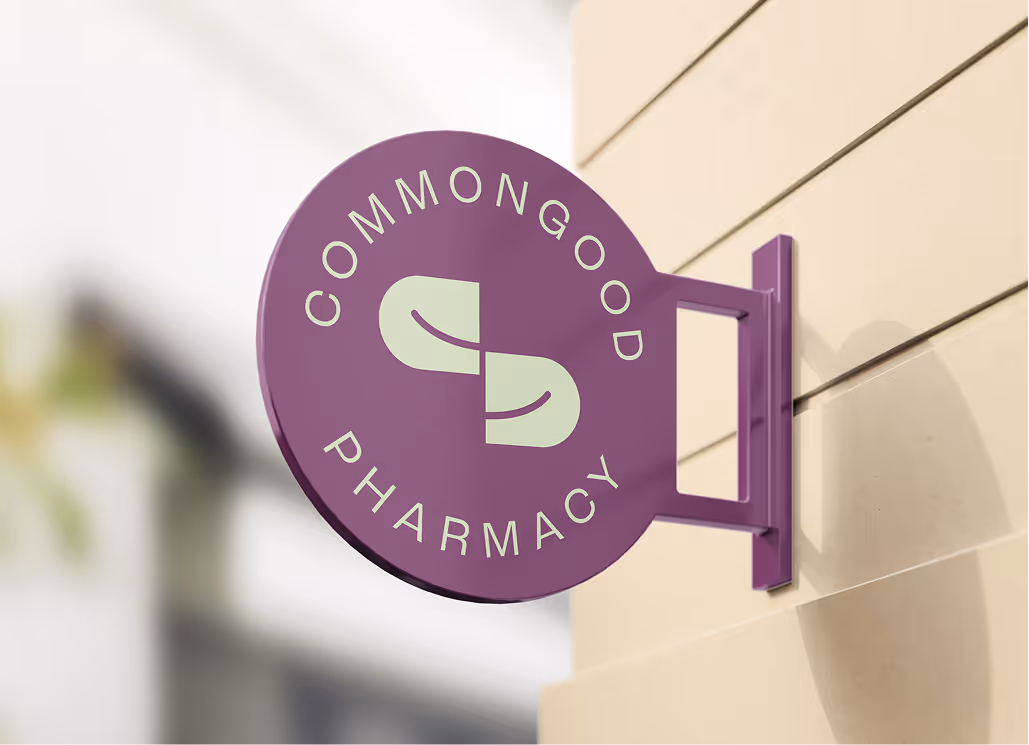 a sign for the 'Common Good' pharmacy
