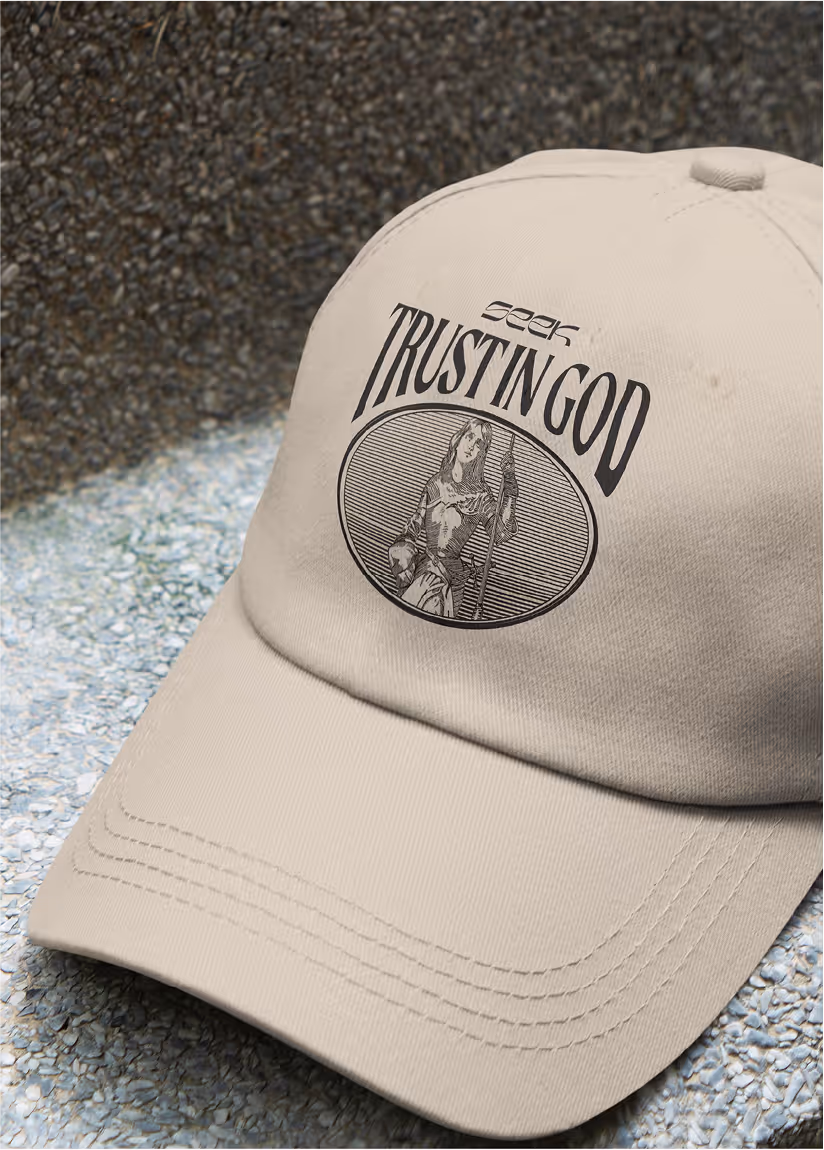 A close up mockup image of a seek conference hat on asphalt.