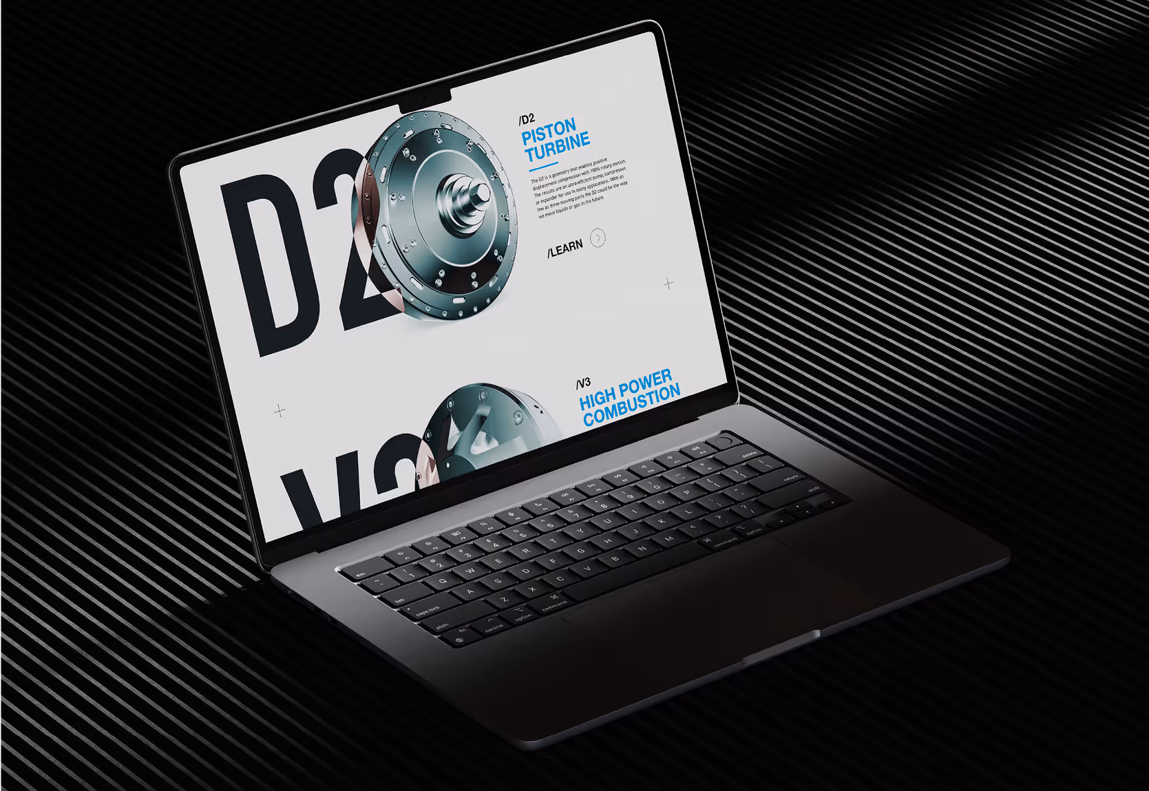 A laptop showcasing the genesis website.